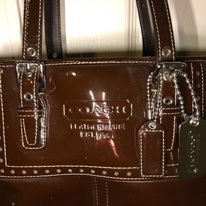 Coach tote handbag, brown patent leather.  10x11